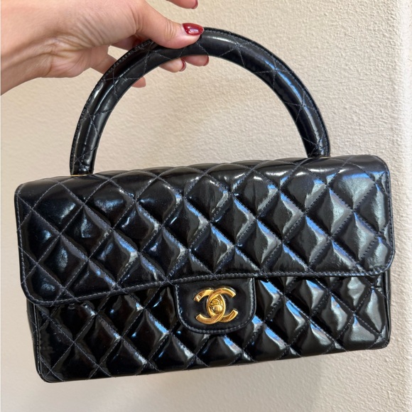 CHANEL | Bags | Chanel Kelly Black Quilted Satchel With Gold Accent ...